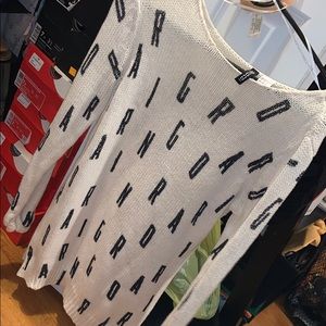 Off white, block lettered sweater